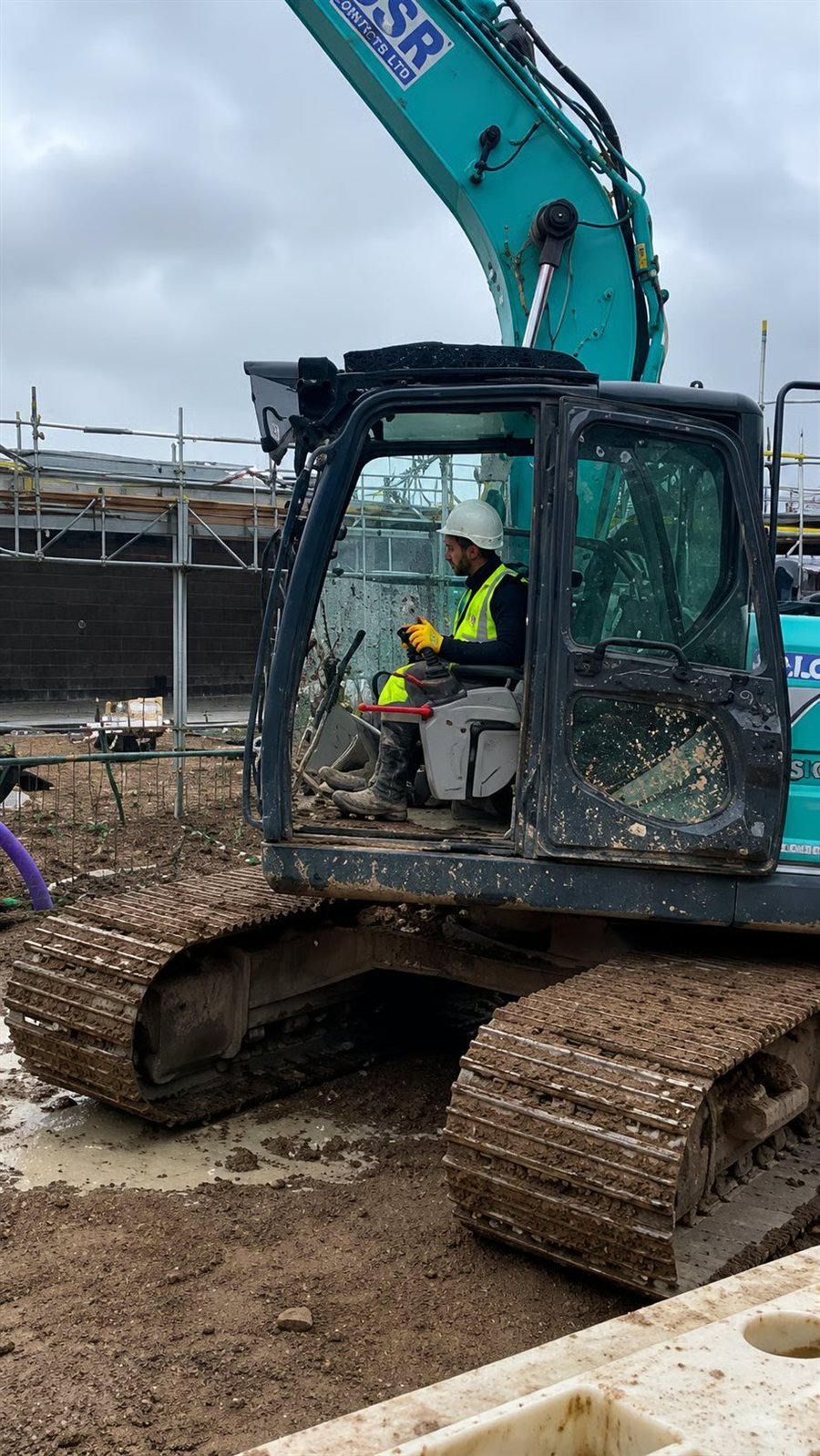 JSR Contracts Limited excavator on site at Friden House, Leeds