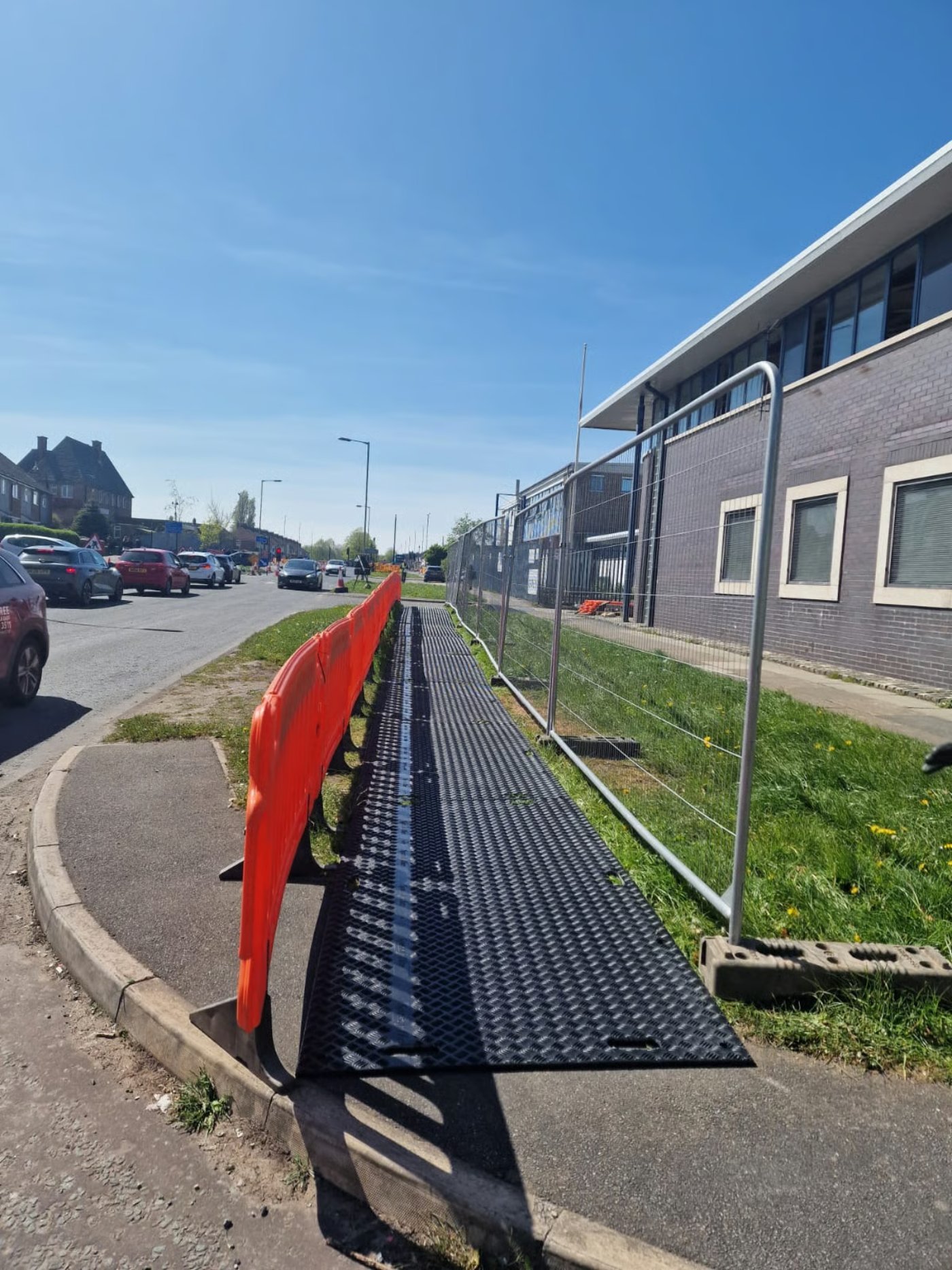 Site hoarding and pedestrian walkway at Friden House, Leeds