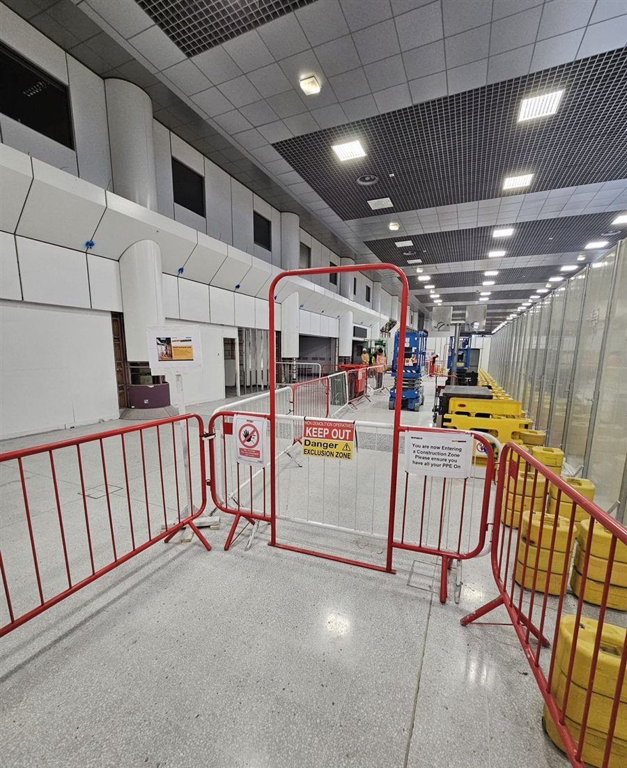 Site secured with exclusion zone barriers at Manchester Airport Terminal 2