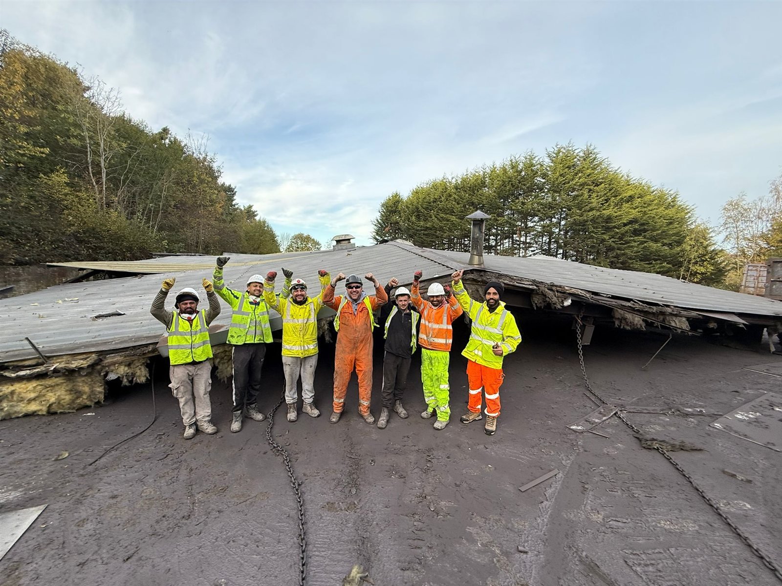 JSR Contracts Limited team celebrating completion of the Sunderland project roof strip