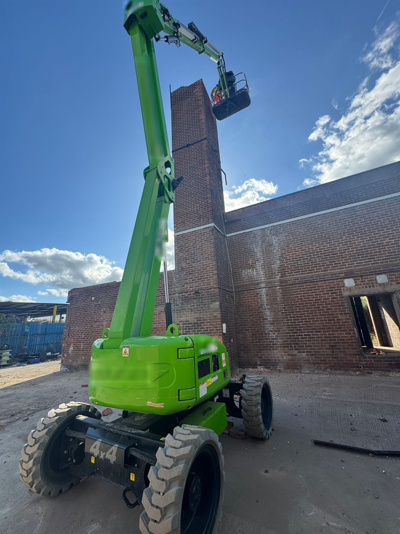 Boom lift access platform working on the Torkington project chimney