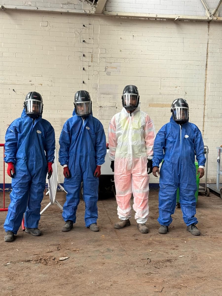 JSR Contracts Limited team in full PPE carrying out non-licensed asbestos works
